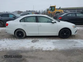 2015 Volkswagen Jetta Sedan 1.8T SE w/Connectivity with VIN 3VWD07AJXFM324240, listed as a IAAI auction lot 41558550 with 141,272 mi miles. Bid and sale history available at carsss.com. Image 13.