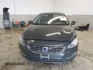 2015 Volvo S60 T5 Drive-E Premier Plus with VIN YV126MFC6F1313759, listed as a IAAI auction lot 41748305 with 43,491 mi miles and . Bid and sale history available at DreamBid. Image 13.