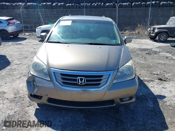 2010 Honda Odyssey Touring with VIN 5FNRL3H9XAB094765, listed as a IAAI auction lot 41892743 with 127,143 mi miles. Bid and sale history available at carsss.com. Image 12.