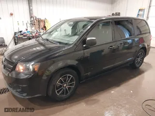 2015 Dodge Grand Caravan SE with VIN 2C4RDGBG6FR587320, listed as a IAAI auction lot 41735841 with 175,587 mi miles. Bid and sale history available at carsss.com. Image 18.