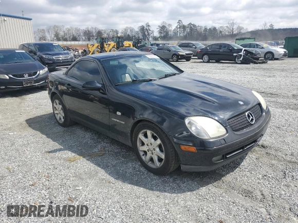 1999 Mercedes-Benz SLK-Class with VIN WDBKK47F2XF102927, listed as a Copart auction lot 50265585 with 184,918 mi miles and Salvage Title. Bid and sale history available at carsss.com. Image 4.