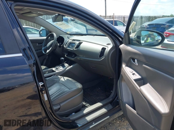 2013 Kia Sportage EX with VIN KNDPCCA21D7457355, listed as a IAAI auction lot 42694813 with 155,879 mi miles and . Bid and sale history available at DreamBid. Image 5.