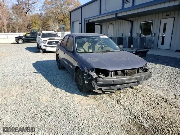 2000 Mazda Protege DX with VIN JM1BJ2222Y0303549, listed as a Copart auction lot 82674064 with 256,624 mi miles and Salvage Title. Bid and sale history available at carsss.com. Image 11.