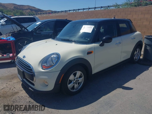 2016 MINI Hardtop 4 Door with VIN WMWXU1C56G2D10605, listed as a IAAI auction lot 42411431 with 35,367 mi miles and . Bid and sale history available at DreamBid. Image 16.