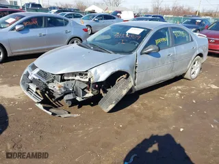 2004 Dodge Stratus SXT with VIN 1B3EL46X64N128617, listed as a IAAI auction lot 41584871 with 140,316 mi miles. Bid and sale history available at carsss.com. Image 2.