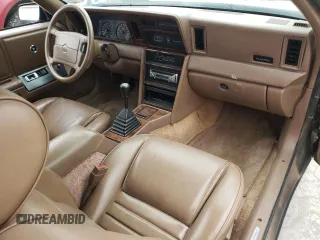 1988 Chrysler LeBaron z VIN 1C3XJ45K9JG438476, wystawiony jako Copart lot #55567334 z przebiegiem 213 424 mil mil oraz Szkoda całkowita • Salvage title. Historia ofert i sprzedaży dostępna na DreamBid. Obrazek 8.