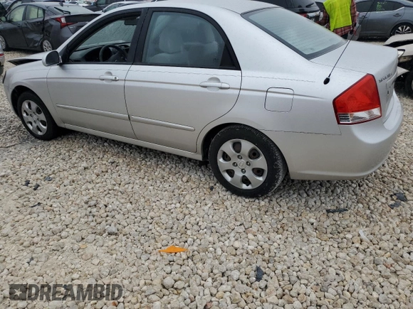 2009 Kia Spectra SX with VIN KNAFE221195656606, listed as a Copart auction lot 84694524 with Not Provided miles and Salvage Title. Bid and sale history available at carsss.com. Image 2.