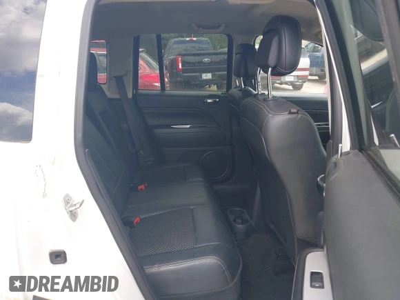 2016 Jeep Compass Latitude z VIN 1C4NJDEB6GD596061, wystawiony jako IAAI lot #42623673 z przebiegiem 180 777 mil mil oraz . Historia ofert i sprzedaży dostępna na DreamBid. Obrazek 8.