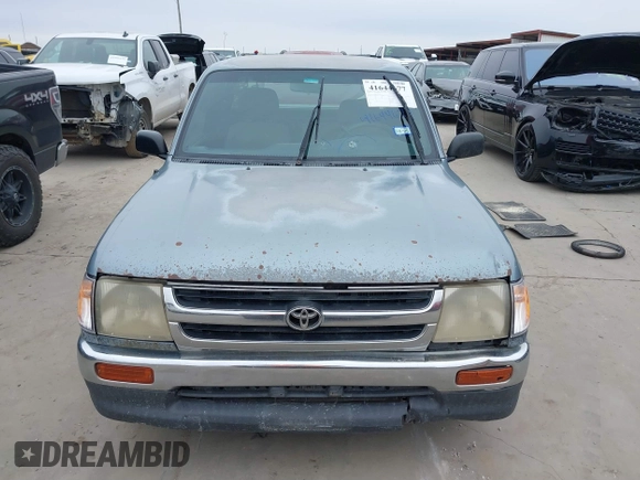 1997 Toyota Tacoma with VIN 4TAVL52N0VZ311543, listed as a IAAI auction lot 41644677 with 292,131 mi miles. Bid and sale history available at carsss.com. Image 13.