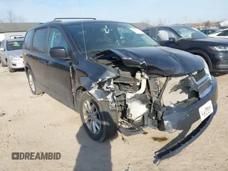 2013 Dodge Grand Caravan SXT with VIN 2C4RDGCG4DR602893, listed as a IAAI auction lot 41747242 with 206,213 mi miles and . Bid and sale history available at DreamBid. Image 1.
