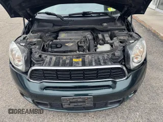 2012 MINI Countryman S z VIN WMWZC5C56CWM13722, wystawiony jako Copart lot #59056595 z przebiegiem 160 215 mil mil oraz Tytuł czysty. Historia ofert i sprzedaży dostępna na DreamBid. Obrazek 7.
