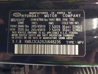 2018 Hyundai Tucson Value with VIN KM8J3CA28JU648236, listed as a IAAI auction lot 41161221 with 104,057 mi miles. Bid and sale history available at carsss.com. Image 9.