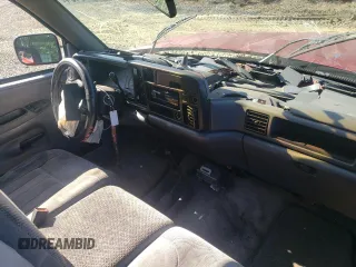 1997 Dodge 2500 with VIN 1B7KF26Z7VJ563055, listed as a Copart auction lot 66916434 with 235,006 mi miles and Salvage Title. Bid and sale history available at DreamBid. Image 8.