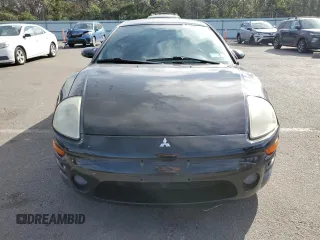 2003 Mitsubishi Eclipse RS with VIN 4A3AC34G23E124425, listed as a Copart auction lot 71744574 with 64,084 mi miles and Salvage Title. Bid and sale history available at DreamBid. Image 5.