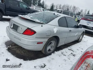 2003 Pontiac Sunfire with VIN 1G2JB14F837149792, listed as a IAAI auction lot 41573556 with 202,119 mi miles. Bid and sale history available at carsss.com. Image 4.