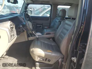2003 Hummer H2 with VIN 5GRGN23U33H114427, listed as a Copart auction lot 76528834 with 133,571 mi miles and Salvage Title. Bid and sale history available at carsss.com. Image 7.