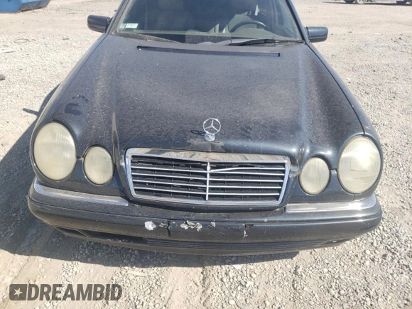 1997 Mercedes-Benz E-Class with VIN WDBJF72F0VA189407, listed as a Copart auction lot 76073234 with 114,692 mi miles and Salvage Title. Bid and sale history available at carsss.com. Image 11.