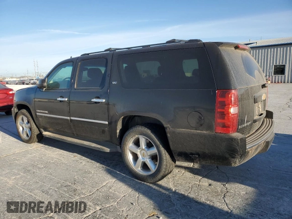 2012 Chevrolet Suburban LTZ with VIN 1GNSKKE71CR310010, listed as a Copart auction lot 48943445 with 311,512 mi miles and Clean title. Bid and sale history available at DreamBid. Image 2.