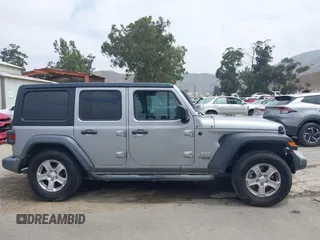 2018 Jeep Wrangler Unlimited Sport S with VIN 1C4HJXDN5JW145340, listed as a IAAI auction lot 42420695 with 92,500 mi miles and . Bid and sale history available at DreamBid. Image 13.