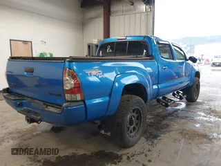 2009 Toyota Tacoma z VIN 5TEMU52N29Z656158, wystawiony jako IAAI lot #41652533 z przebiegiem 138 563 mil mil oraz . Historia ofert i sprzedaży dostępna na DreamBid. Obrazek 4.