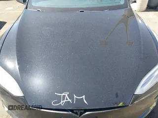 2018 Tesla Model S 75D with VIN 5YJSA1E20JF282889, listed as a IAAI auction lot 41823505 with 110,049 mi miles and . Bid and sale history available at DreamBid. Image 10.