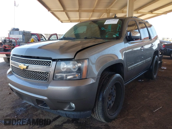 2007 Chevrolet Tahoe LTZ with VIN 1GNFK13037J331012, listed as a IAAI auction lot 42122457 with 111,130 mi miles and . Bid and sale history available at DreamBid. Image 2.
