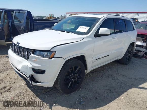 2021 Jeep Grand Cherokee Laredo X with VIN 1C4RJFAG7MC705966, listed as a IAAI auction lot 41784567 with 91,153 mi miles and . Bid and sale history available at DreamBid. Image 2.