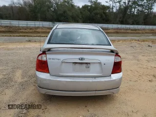2005 Kia Spectra LX with VIN KNAFE121255202207, listed as a Copart auction lot 47648205 with 0 mi miles and Salvage Title. Bid and sale history available at carsss.com. Image 6.