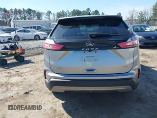2022 Ford Edge SEL z VIN 2FMPK4J91NBA64868, wystawiony jako IAAI lot #38954615 z przebiegiem 33 911 mil mil oraz . Historia ofert i sprzedaży dostępna na DreamBid. Obrazek 16.
