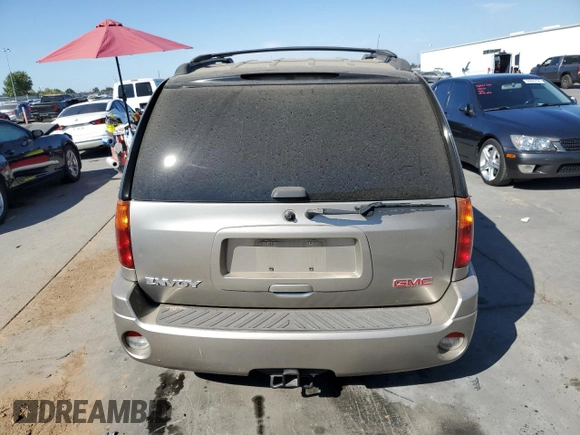 2003 GMC Envoy SLT with VIN 1GKDT13S832327481, listed as a Copart auction lot 72253474 with Not Provided miles and Salvage Title. Bid and sale history available at DreamBid. Image 6.