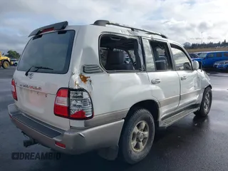 1999 Toyota Land Cruiser with VIN JT3HT05J1X0071346, listed as a IAAI auction lot 41215078 with 1 mi miles. Bid and sale history available at carsss.com. Image 4.