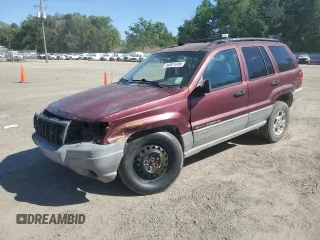 2000 Jeep Grand Cherokee Laredo с VIN 1J4G248S7YC220956, выставлен на аукционе Copart как лот 52651305 с пробегом 263 038 миль миль и Списание • Salvage title. История ставок и продаж доступна на DreamBid. Изображение 1.