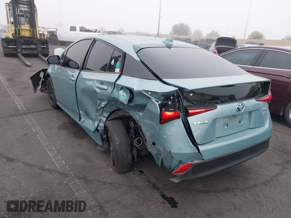 2022 Toyota Prius L Eco with VIN JTDKAMFU9N3186859, listed as a IAAI auction lot 41486941 with 122,665 mi miles and . Bid and sale history available at DreamBid. Image 3.