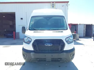 2023 Ford Transit Cargo with VIN 1FTBR2X86PKA51393, listed as a IAAI auction lot 41769269 with 91,032 mi miles and . Bid and sale history available at DreamBid. Image 12.