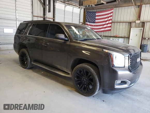 2019 GMC Yukon SLT with VIN 1GKS2BKC8KR163973, listed as a Copart auction lot 59042214 with 119,269 mi miles and Salvage Title. Bid and sale history available at carsss.com. Image 4.