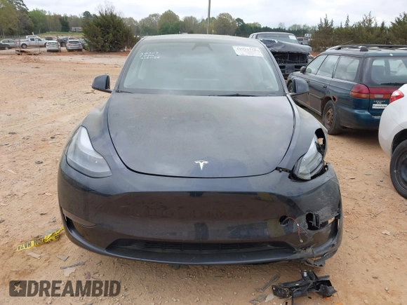 2024 Tesla Model Y with VIN 7SAYGDED3RA303113, listed as a IAAI auction lot 41915760 with 12,917 mi miles and . Bid and sale history available at DreamBid. Image 11.