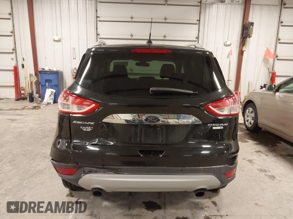 2014 Ford Escape Titanium with VIN 1FMCU9J95EUD85537, listed as a IAAI auction lot 41472236 with 154,796 mi miles. Bid and sale history available at carsss.com. Image 16.