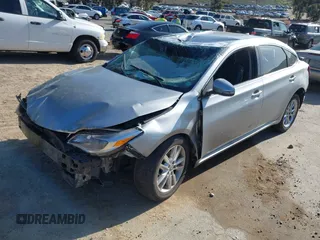 2015 Toyota Avalon Limited with VIN 4T1BK1EBXFU141061, listed as a IAAI auction lot 41943384 with Not Provided miles and . Bid and sale history available at DreamBid. Image 2.