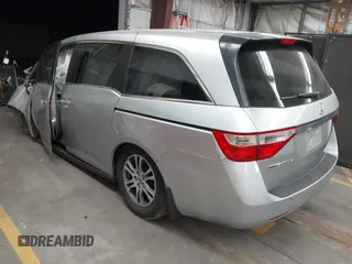 2011 Honda Odyssey EX-L with VIN 5FNRL5H62BB083682, listed as a IAAI auction lot 41425267 with 169,166 mi miles and . Bid and sale history available at carsss.com. Image 3.