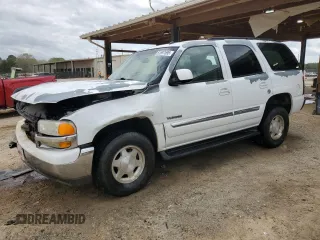 2005 GMC Yukon SLT with VIN 1GKEC13Z45J204402, listed as a Copart auction lot 51697595 with 242,881 mi miles and Salvage Title. Bid and sale history available at carsss.com. Image 1.