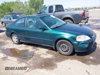 1999 Honda Civic EX z VIN 1HGEJ8149XL063286, wystawiony jako IAAI lot #42552913 z przebiegiem 135 363 mil mil oraz . Historia ofert i sprzedaży dostępna na DreamBid. Obrazek 1.