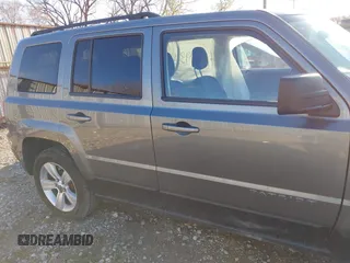 2013 Jeep Patriot Latitude with VIN 1C4NJPFA1DD169521, listed as a IAAI auction lot 41812936 with 133,088 mi miles. Bid and sale history available at carsss.com. Image 13.