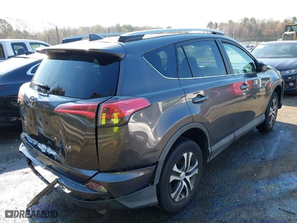 2016 Toyota RAV4 LE with VIN 2T3ZFREV7GW305998, listed as a IAAI auction lot 41869024 with 163,463 mi miles. Bid and sale history available at carsss.com. Image 4.