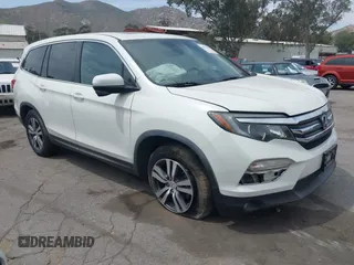 2016 Honda Pilot EX-L with VIN 5FNYF5H55GB015166, listed as a IAAI auction lot 42003009 with 142,488 mi miles and . Bid and sale history available at carsss.com. Image 1.