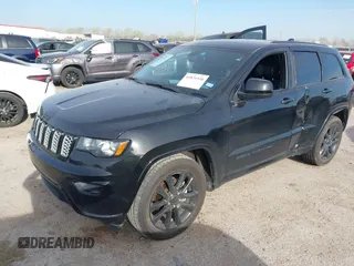 2018 Jeep Grand Cherokee Laredo E with VIN 1C4RJEAG4JC311699, listed as a IAAI auction lot 41876920 with 42,584 mi miles and . Bid and sale history available at DreamBid. Image 17.