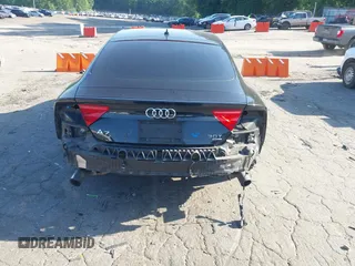 2014 Audi A7 Premium Plus z VIN WAUWGAFC4EN092525, wystawiony jako IAAI lot #42331183 z przebiegiem 183 258 mil mil oraz . Historia ofert i sprzedaży dostępna na DreamBid. Obrazek 6.