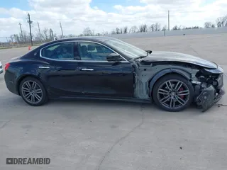 2017 Maserati Ghibli with VIN ZAM57XSA6H1218753, listed as a IAAI auction lot 41833235 with 42,135 mi miles. Bid and sale history available at carsss.com. Image 13.