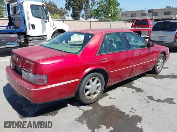 1996 Cadillac Seville Touring STS with VIN 1G6KY5290TU835414, listed as a IAAI auction lot 42051767 with 185,798 mi miles. Bid and sale history available at carsss.com. Image 4.