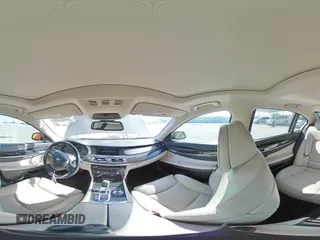 2012 BMW 7 Series 740i with VIN WBAKA4C54CC613419, listed as a Copart auction lot 54420885 with 104,006 mi miles and Salvage Title. Bid and sale history available at DreamBid. Image 14.
