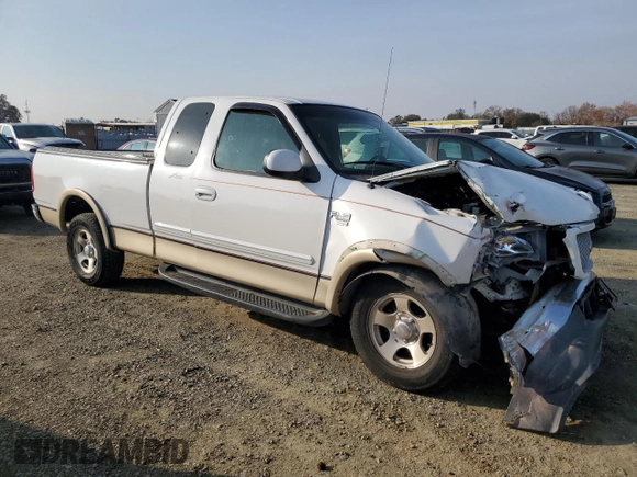 1999 Ford F-150 XL with VIN 1FTRX17L2XKC10123, listed as a Copart auction lot 83158894 with 57,446 mi miles and Salvage Title. Bid and sale history available at carsss.com. Image 4.
